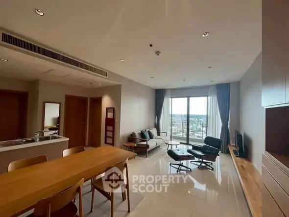 Spacious modern living room with city view and elegant furniture