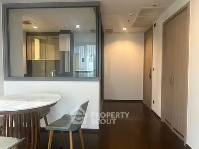 Modern apartment interior with open layout and stylish dining area