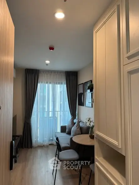 Cozy modern living room with natural light and stylish decor