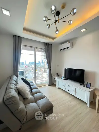 Modern living room with city view, stylish lighting, and cozy sofa in a high-rise apartment.