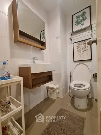 Modern bathroom with stylish decor and practical storage solutions
