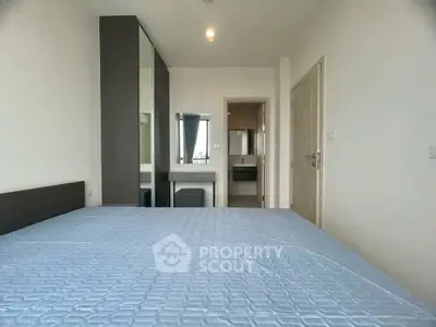 Modern bedroom with ensuite bathroom and stylish decor