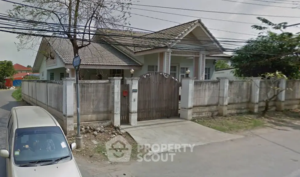 Charming suburban house with gated entrance and spacious driveway