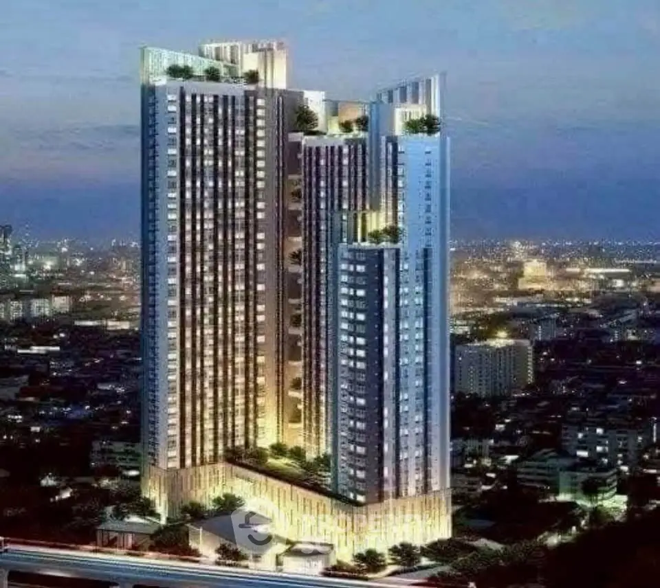 Stunning high-rise building with modern architecture and cityscape view at dusk.