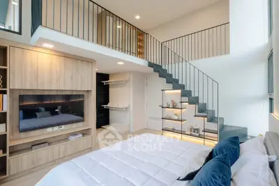 Modern loft bedroom with stylish staircase and built-in storage, perfect for urban living.