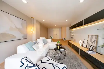 Spacious modern living room with stylish decor and cozy seating area