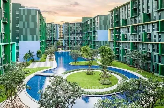 Modern apartment complex with stunning pool and lush gardens