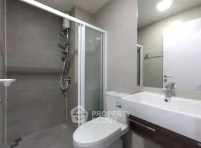 Modern bathroom with sleek shower and contemporary fixtures