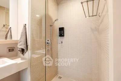 Modern bathroom with sleek shower design and elegant tile work