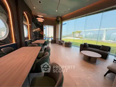 Luxurious modern lounge with panoramic windows and stylish decor