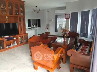 Spacious living room with elegant wooden furniture and modern decor