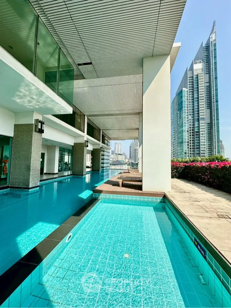 Luxurious rooftop pool with stunning cityscape views and modern architecture.