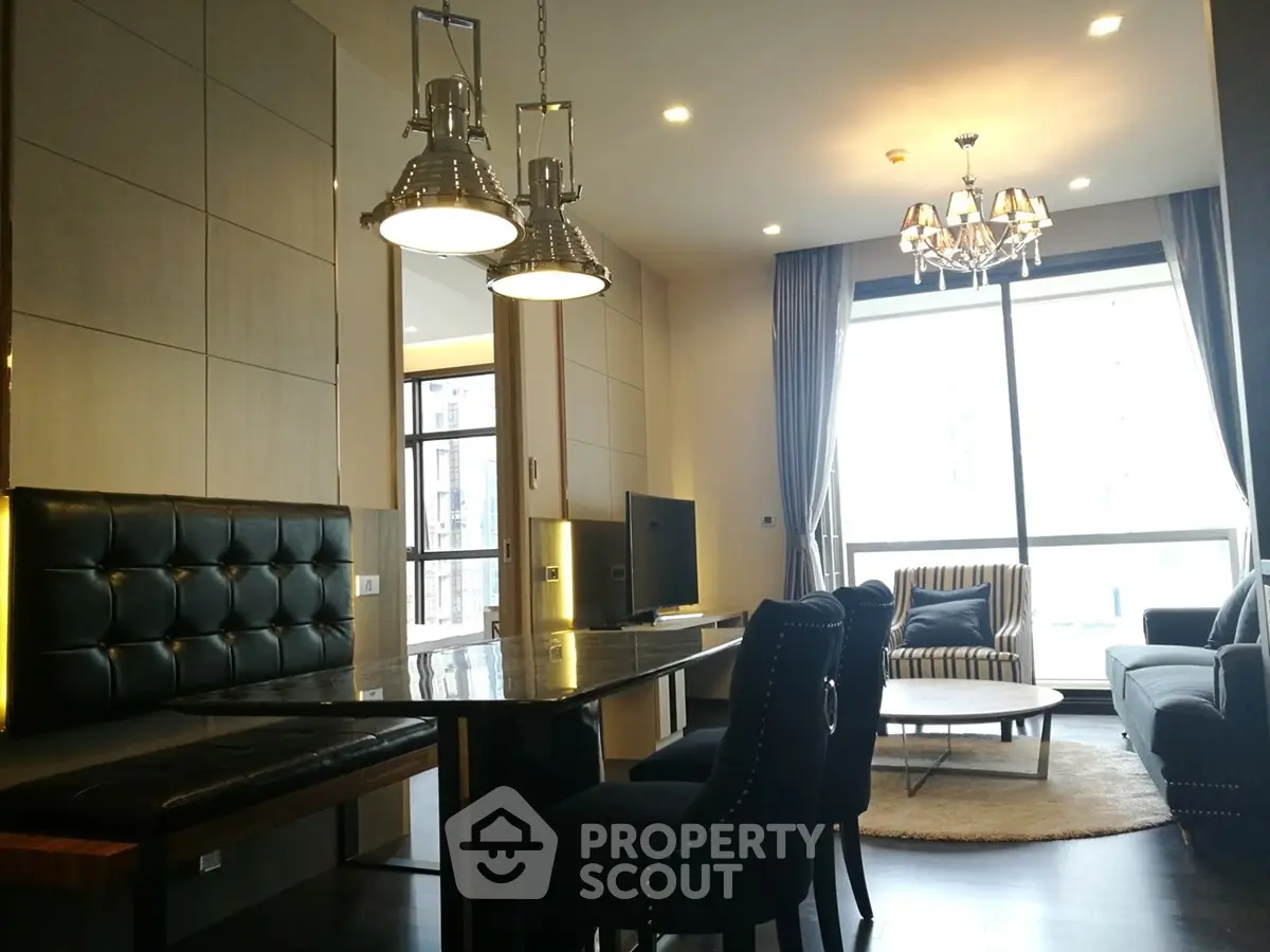 Luxurious modern living room with elegant lighting and large windows