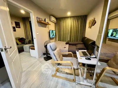 Cozy bedroom with study area and modern decor in a stylish apartment