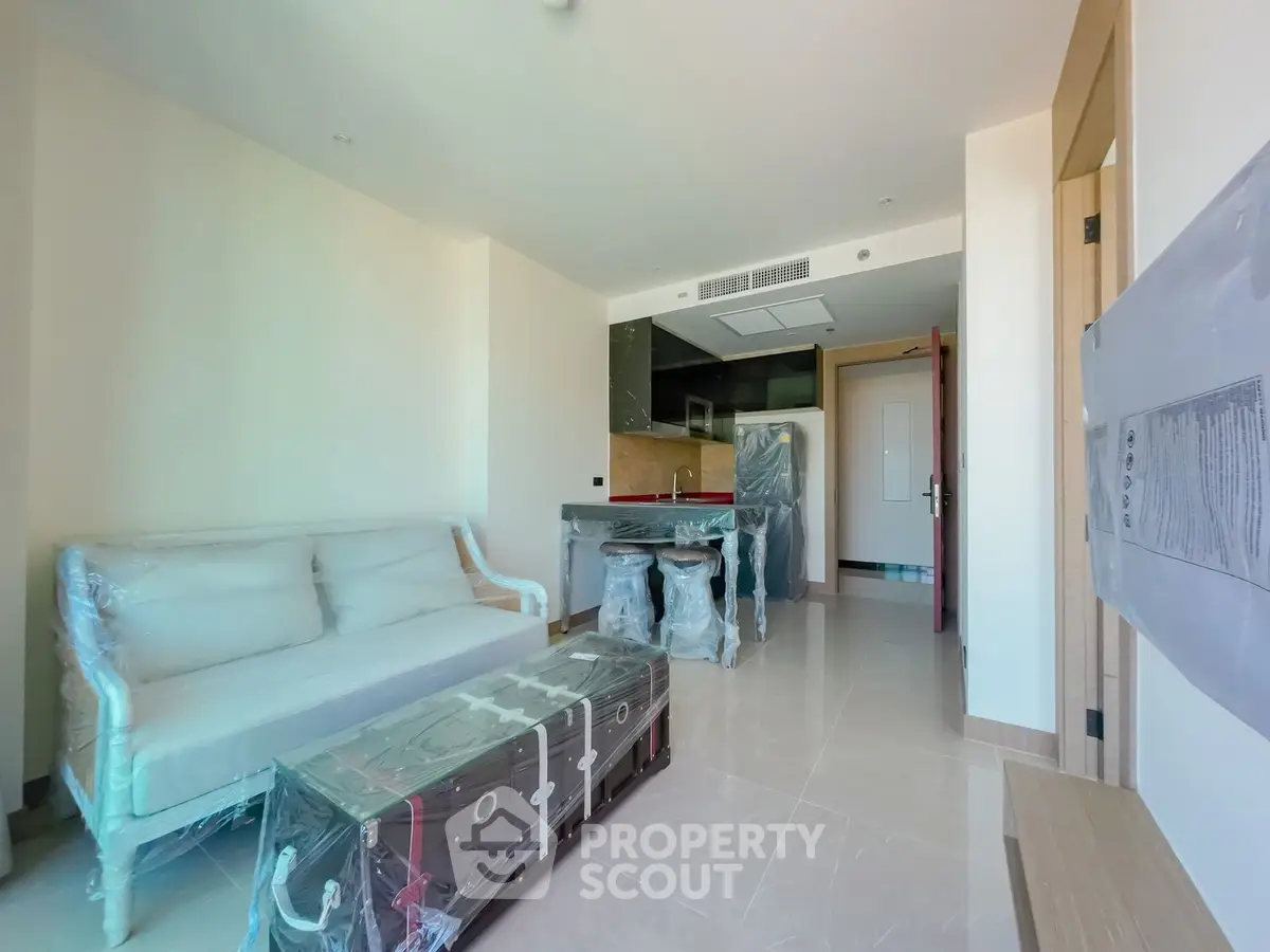 Modern living room with open kitchen layout and new furniture