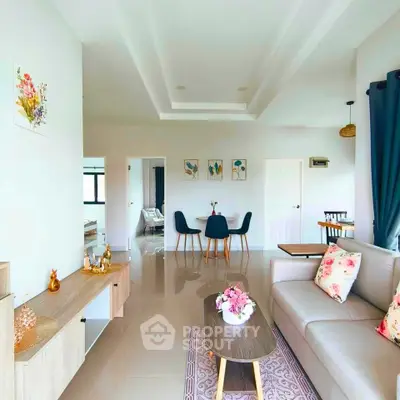 Spacious modern living room with elegant decor and natural light