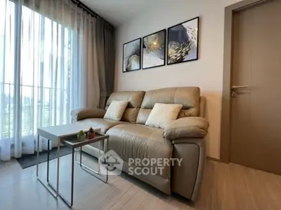 Modern living room with leather sofa and stylish decor