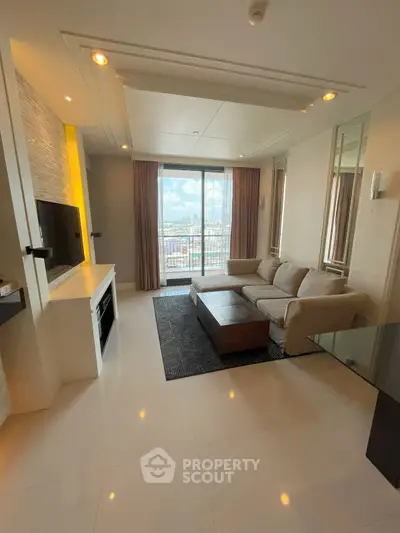 Luxurious living room with modern decor and stunning city view from balcony.