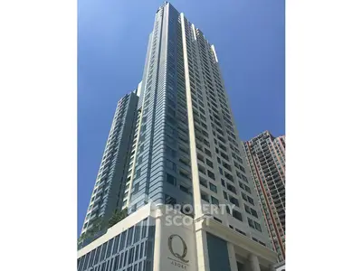 Stunning high-rise building with modern architecture and panoramic city views.