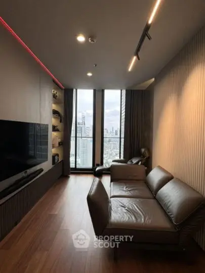 Modern living room with city view, sleek furniture, and ambient lighting.