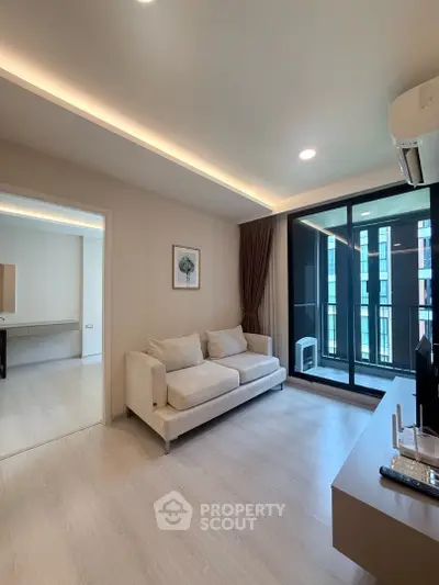 Modern living room with balcony view in a stylish apartment