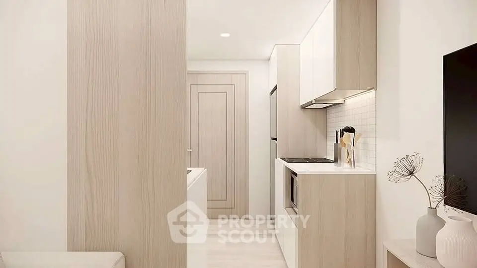 Modern minimalist kitchen with sleek cabinetry and integrated appliances