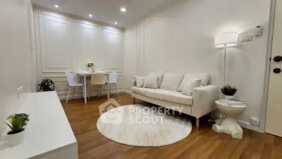 Chic and cozy living room with modern decor and wooden flooring