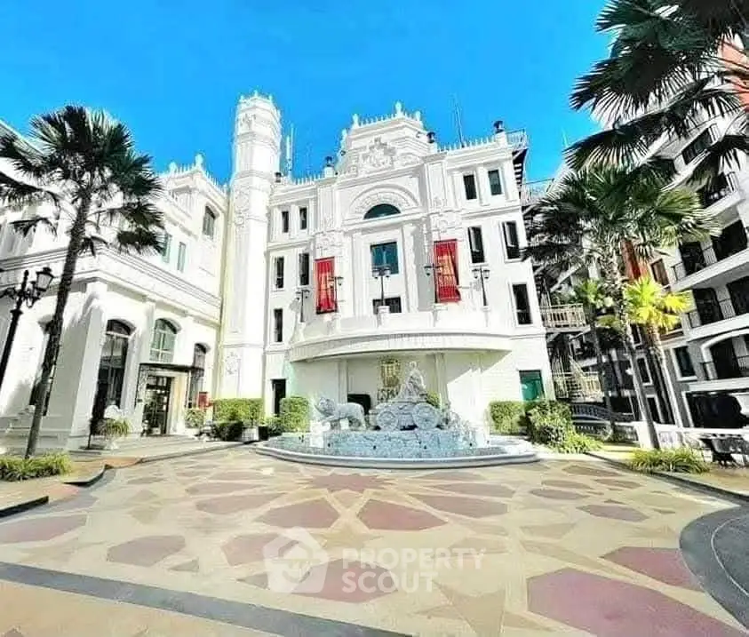 Stunning European-style building with elegant facade and lush landscaping in prime location.