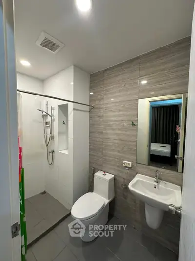 Modern bathroom with sleek design and glass shower enclosure