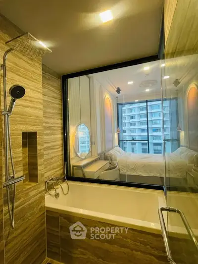 Luxurious bathroom with modern shower and bathtub overlooking a city view through glass wall.