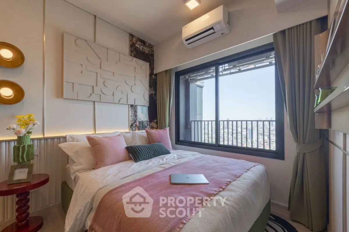 Chic bedroom with city view, modern decor, and cozy ambiance