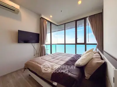 Luxurious bedroom with stunning ocean view and modern decor