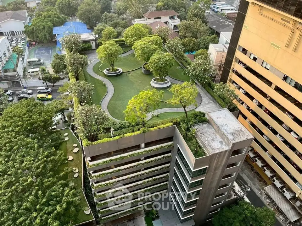 Stunning rooftop garden with lush greenery on a modern building, offering a serene urban oasis.