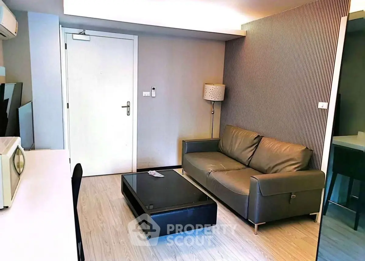 Modern living room with sleek furniture and stylish decor