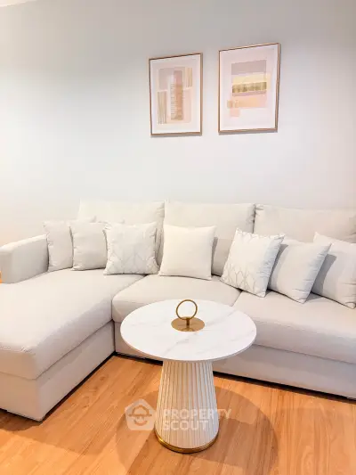Stylish living room with modern sofa and elegant decor, perfect for relaxation and entertaining.