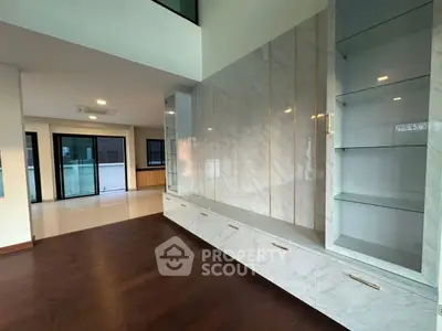 Luxurious modern living room with marble accents and spacious open layout