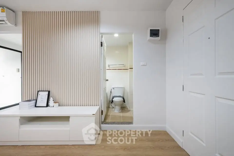 Modern apartment interior with sleek design and wooden flooring