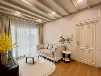 Elegant living room with stylish decor and natural light