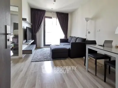Modern living room with sleek furniture and natural light