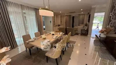 Elegant dining room with modern decor and ample natural light