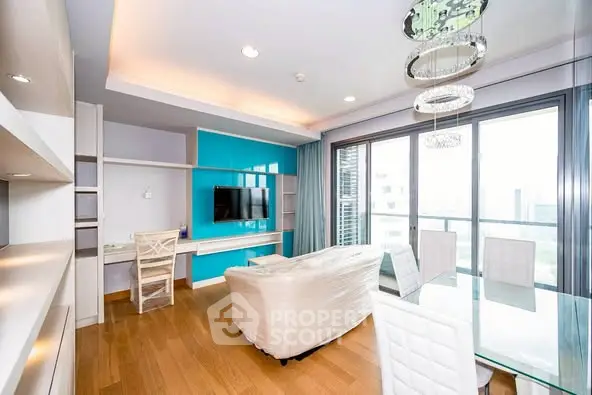 Modern living room with floor-to-ceiling windows and stylish decor