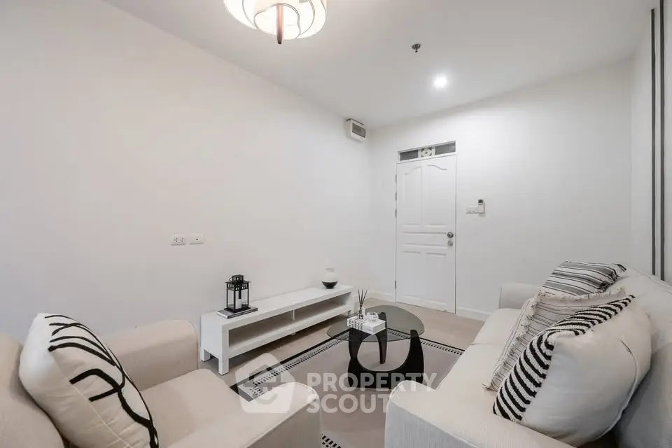 Modern living room with stylish decor and cozy seating area