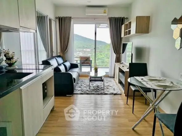 Modern living room with mountain view and open kitchen layout