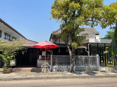 Charming residential property with lush greenery and modern design, perfect for family living.