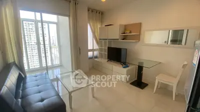 Modern living room with sleek furniture and city view balcony in high-rise apartment.