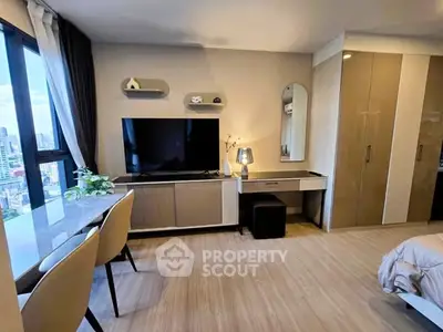 Modern bedroom with city view, sleek furniture, and stylish decor