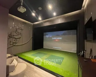 Luxurious home theater with golf simulator and modern seating