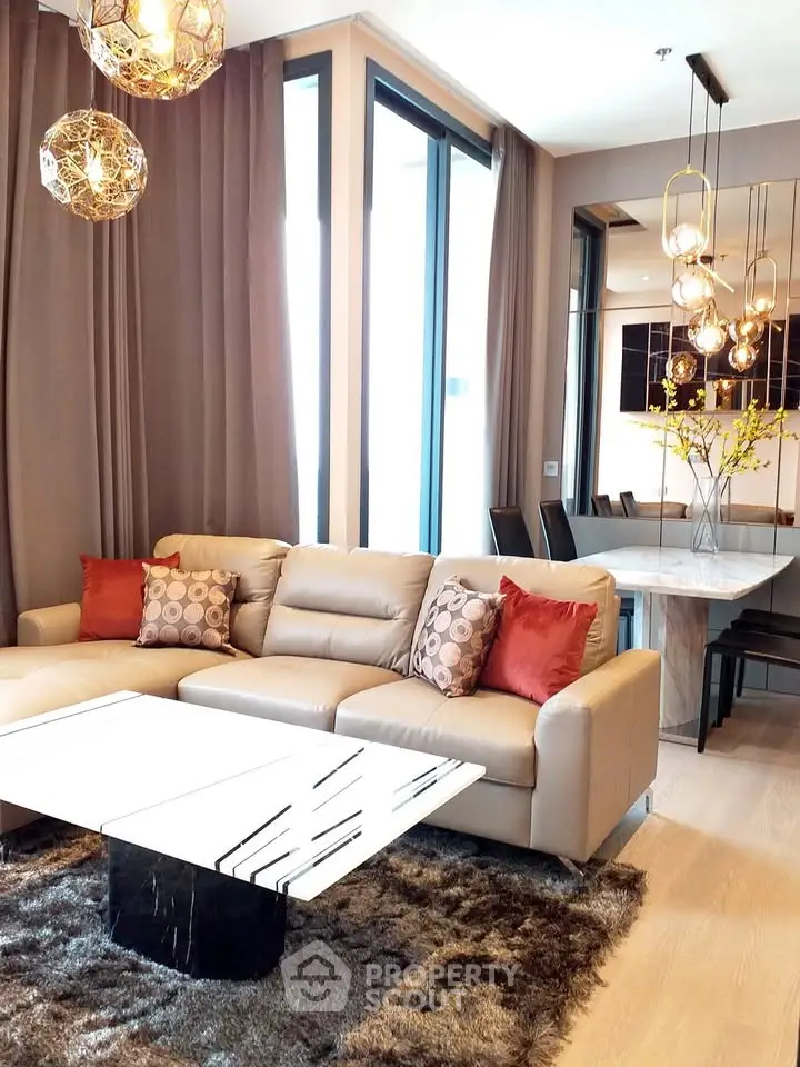 Luxurious modern living room with elegant lighting and plush seating