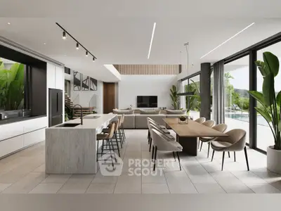 Luxurious open-plan kitchen and living area with modern design and large windows.