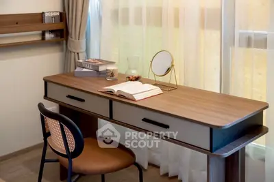 Chic study area with modern desk and chair, perfect for productivity and style.